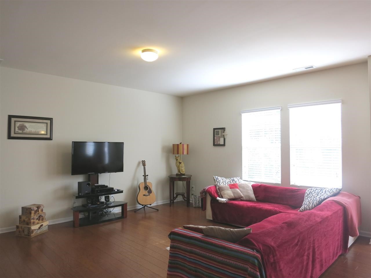 3808 Althorp Drive Raleigh, NC 27616 - Photo 3 of 25 The spacious Living Rm w/dbl windows is open to the lg Bfast area and Kitchen.