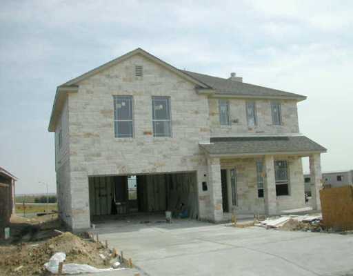 1630 Hidden Springs Path Round Rock, TX 78665 - Photo 1 of 1 a front view of a house with a yard