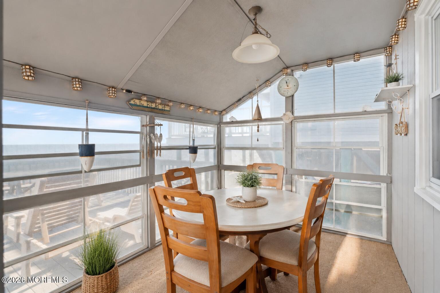 246 Cove Road Newport, NJ 08345 - Photo 13 of 21 a view of a dining room with furniture window and wooden floor