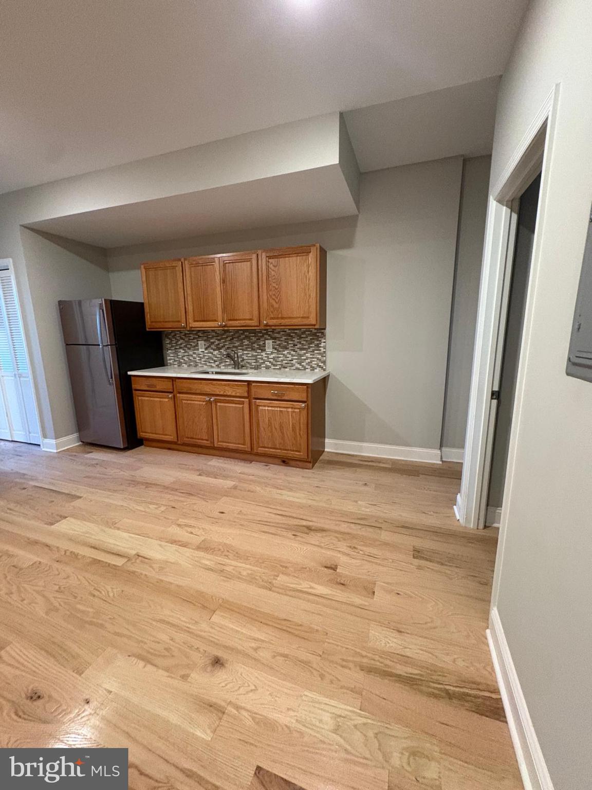 2900 North 5th Street, Unit 4 Philadelphia, PA 19133 - Photo 2 of 7 a view of room with window and hardwood floor