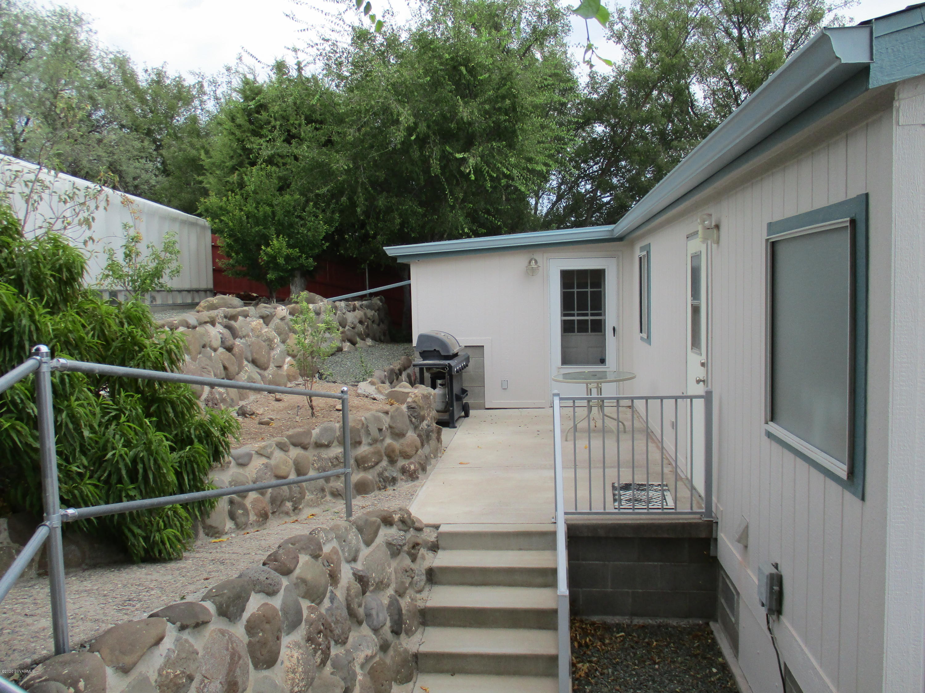 4190 East Aztec Road Rimrock, AZ 86335 - Photo 28 of 35 a view of a house with a small yard