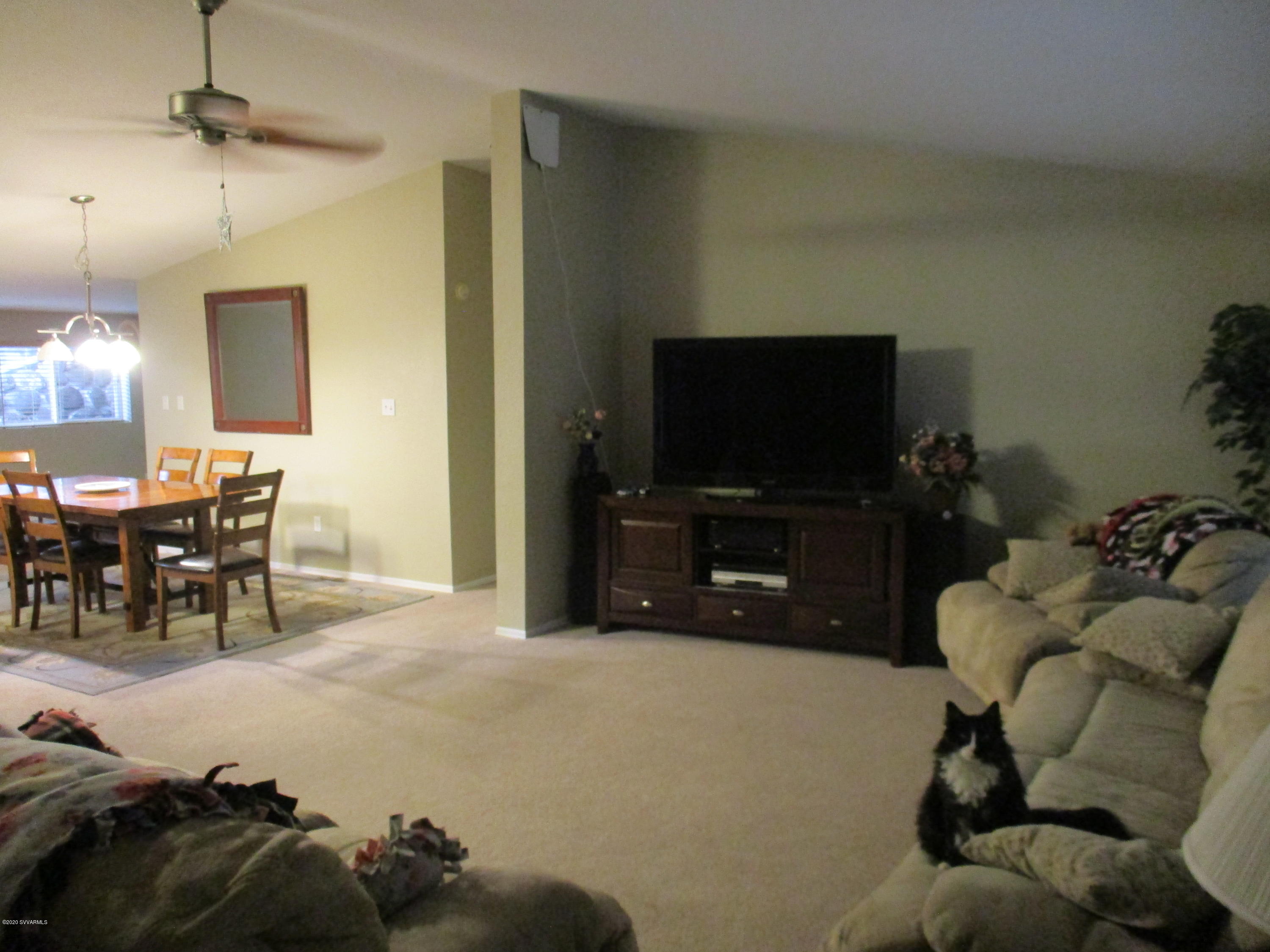 4190 East Aztec Road Rimrock, AZ 86335 - Photo 4 of 35 a living room with furniture and a flat screen tv