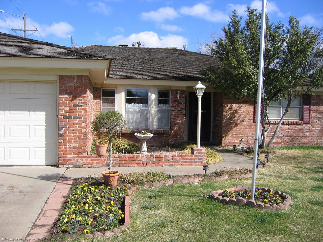 7212 Calumet Road Amarillo, TX 79106 - Photo 1 of 8 a front view of a house