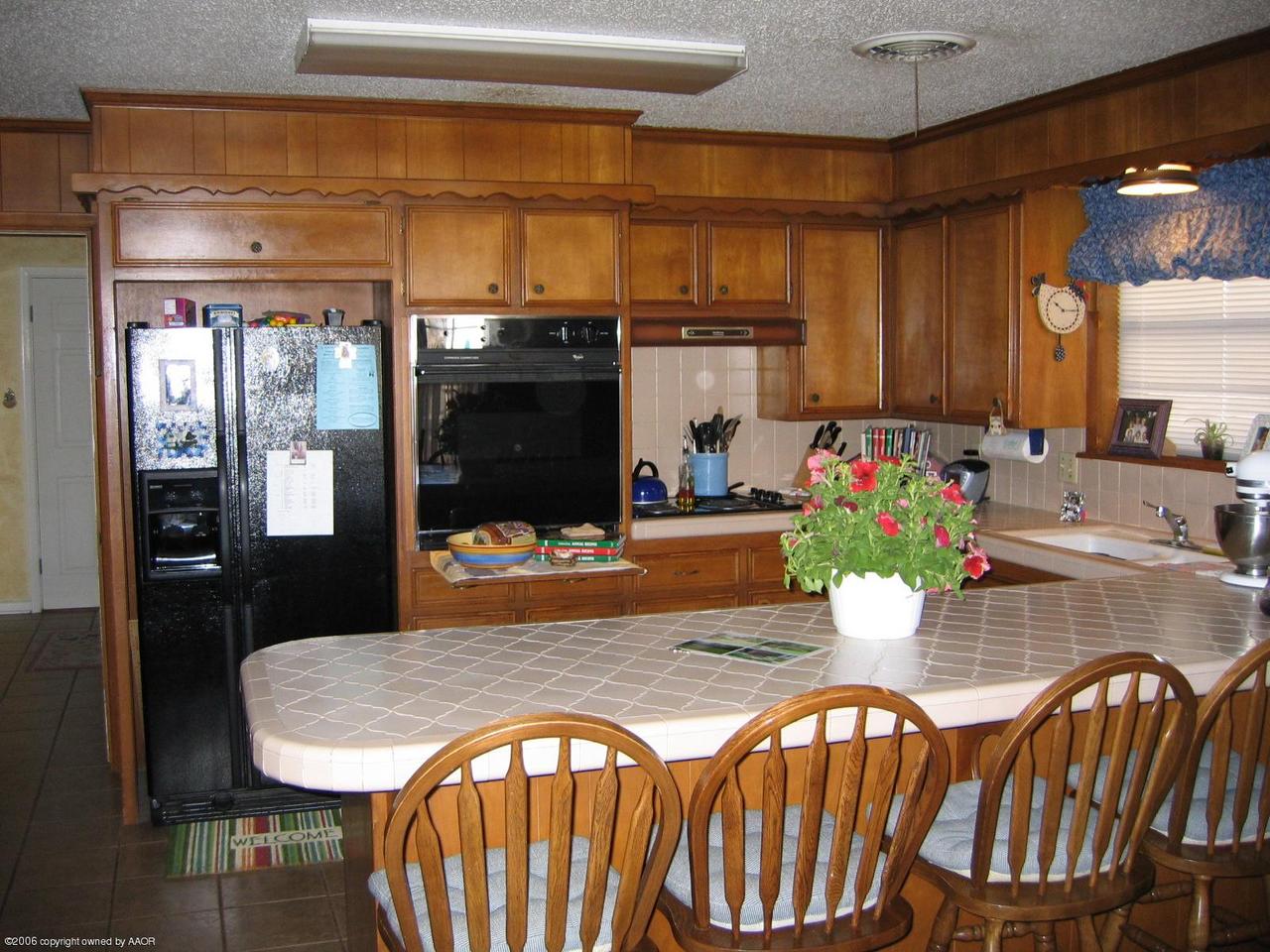 7212 Calumet Road Amarillo, TX 79106 - Photo 4 of 8 a view of a dining room with furniture