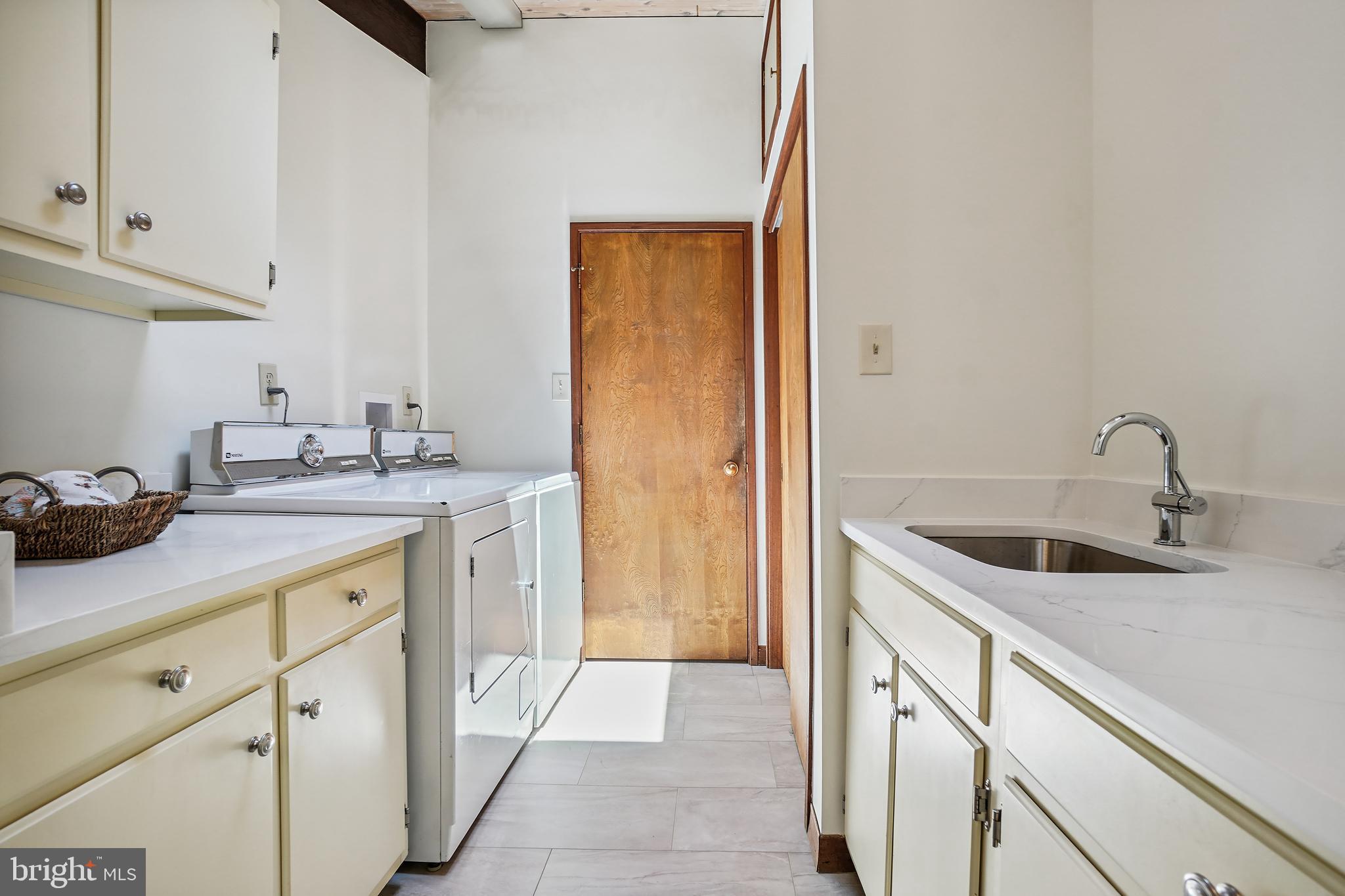 709 Springloch Road Silver Spring, MD 20904 - Photo 11 of 42 Laundry off of kitchen