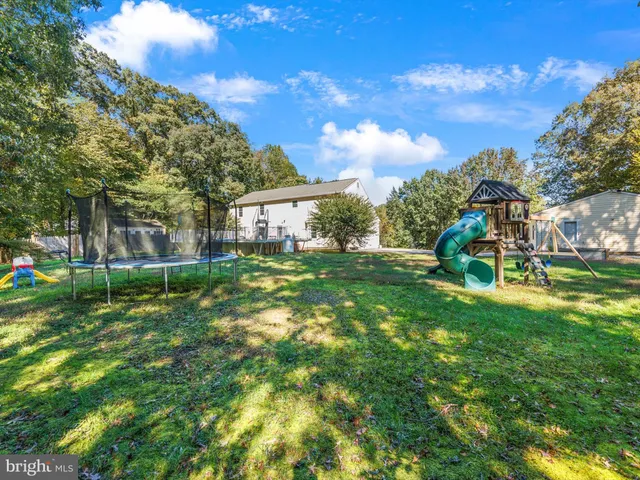 a view of a house with a big yard