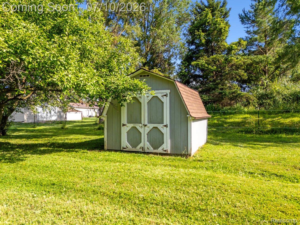 3381 North Fleming Road Fowlerville, MI 48836 - Photo 13 of 29 Shed for extra storage