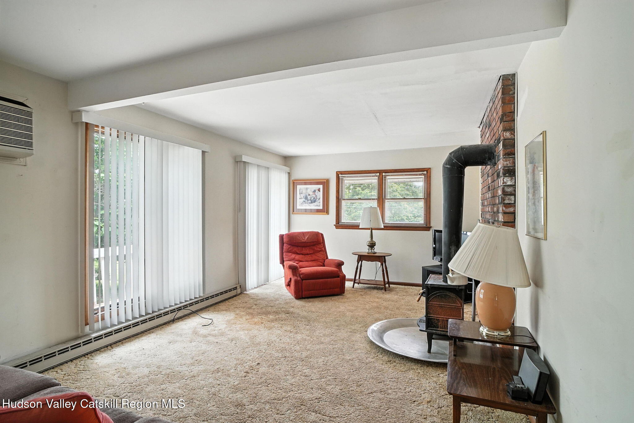 136 Kautz Road Callicoon, NY 12723 - Photo 11 of 51 a room with furniture and a window