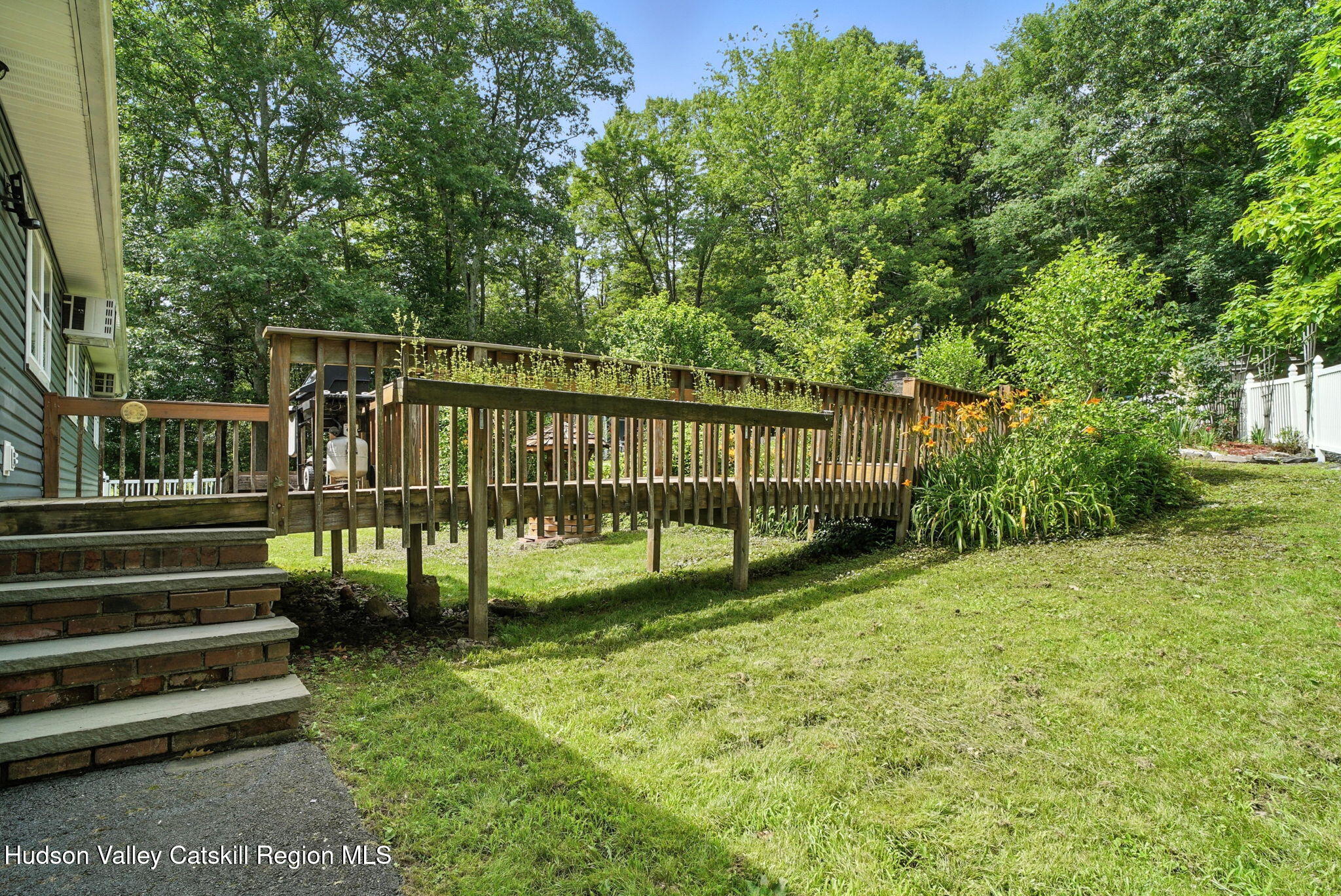 136 Kautz Road Callicoon, NY 12723 - Photo 24 of 51 a view of a deck with a yard