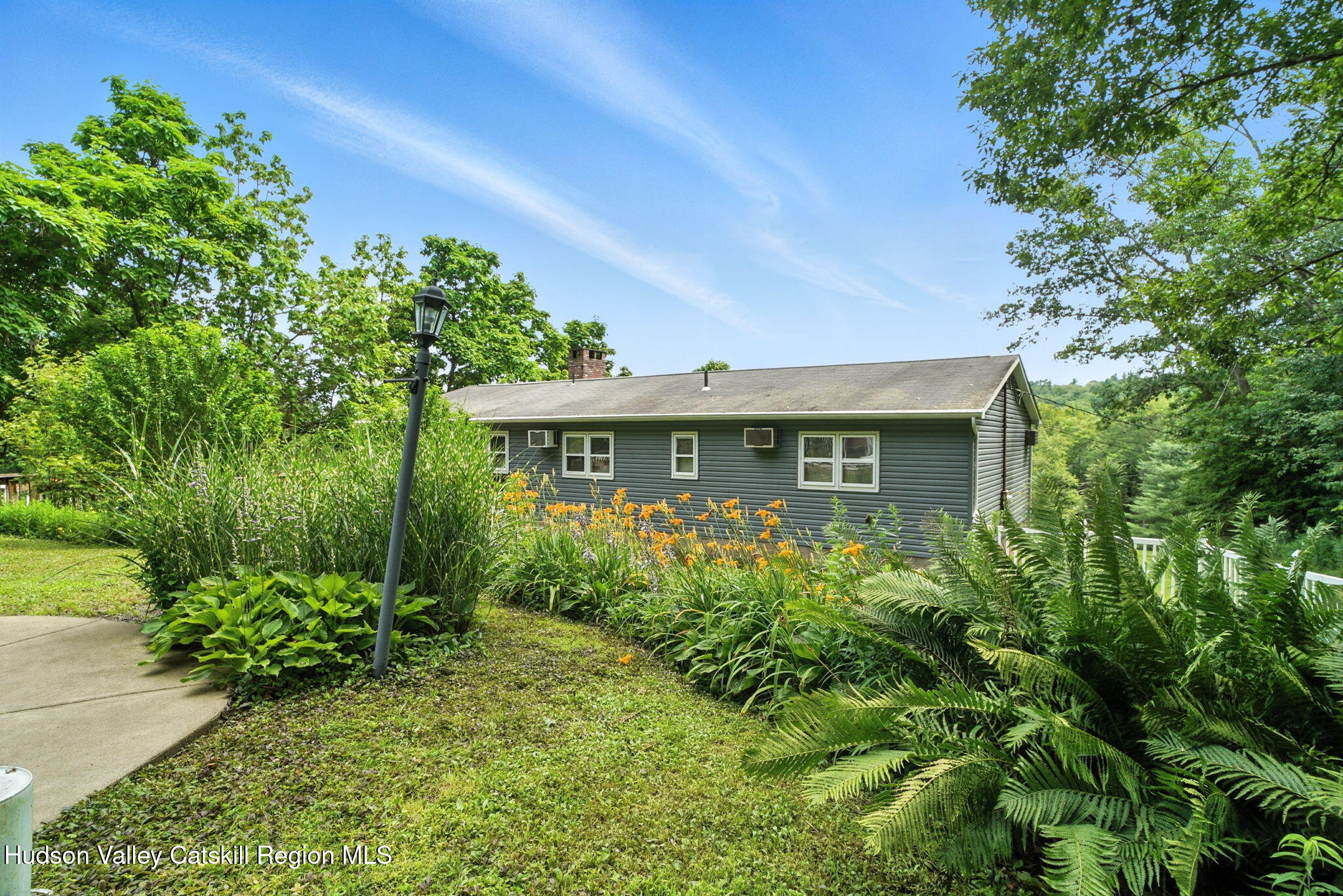 136 Kautz Road Callicoon, NY 12723 - Photo 41 of 51 a front view of a house with a garden