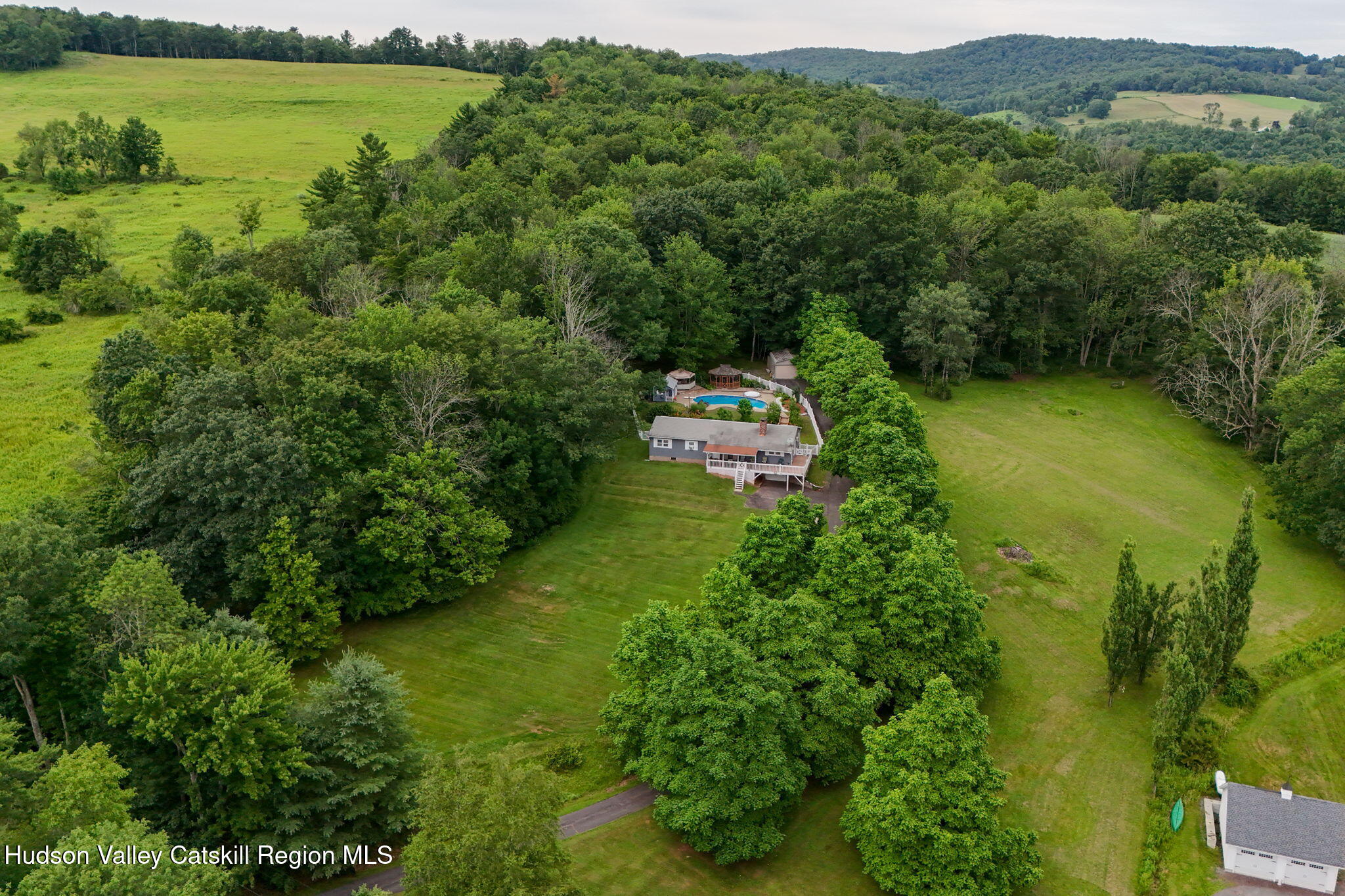 136 Kautz Road Callicoon, NY 12723 - Photo 43 of 51 a view of a garden with a lake