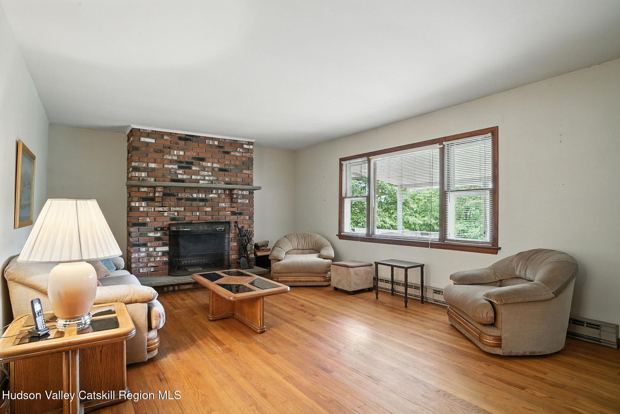 136 Kautz Road Callicoon, NY 12723 - Photo 6 of 51 a living room with furniture and a large window