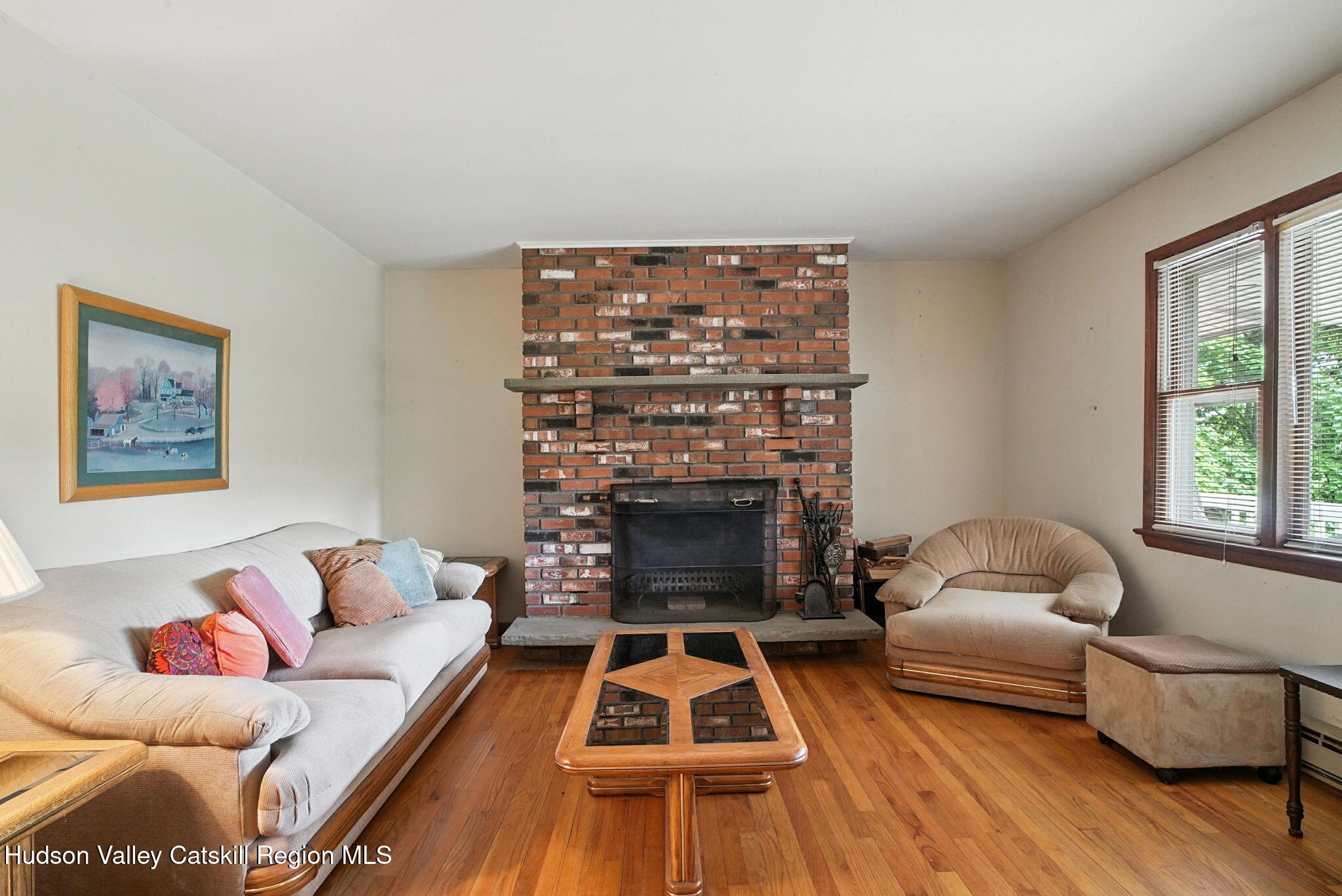 136 Kautz Road Callicoon, NY 12723 - Photo 8 of 51 a living room with furniture and a fireplace