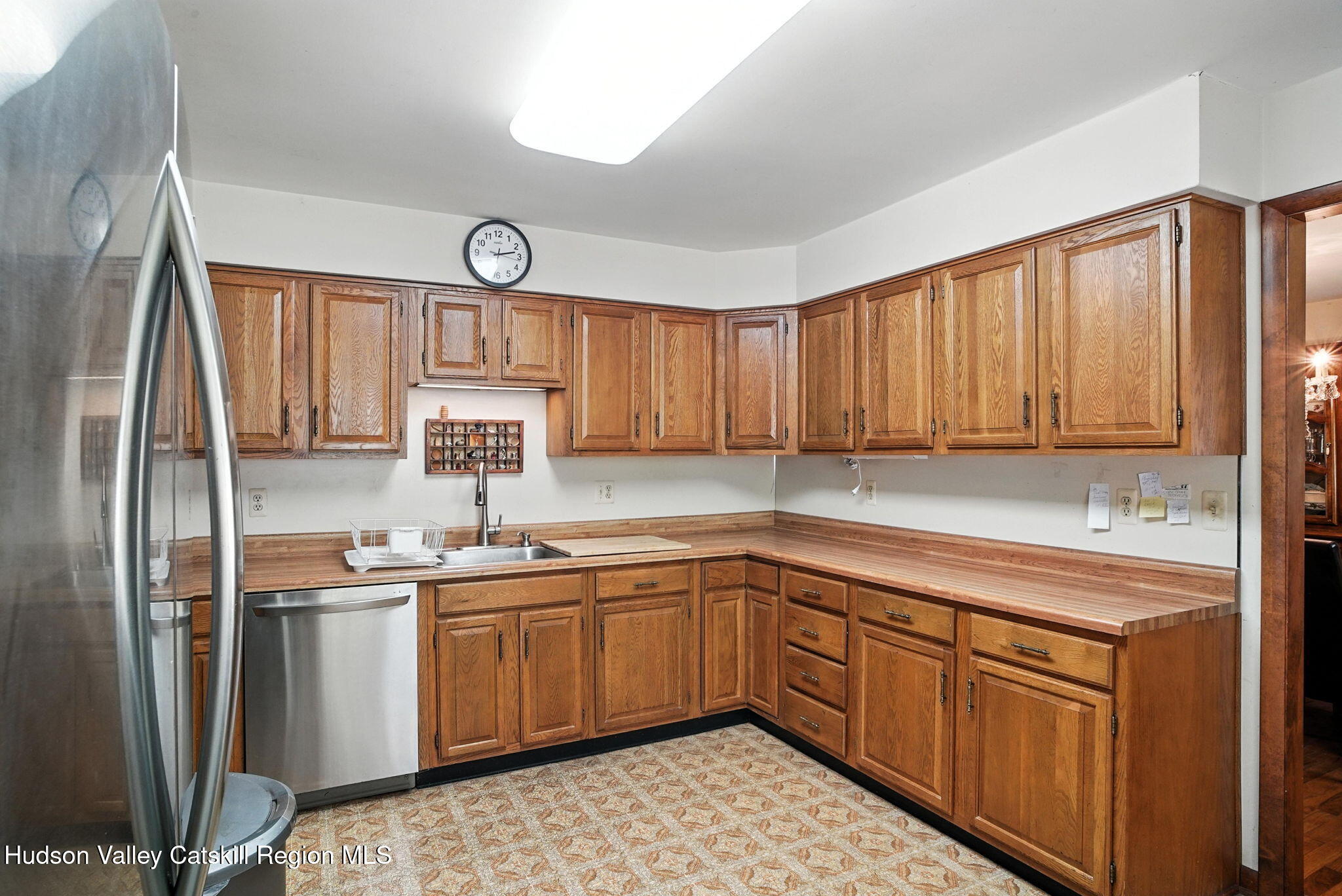 136 Kautz Road Callicoon, NY 12723 - Photo 9 of 51 a kitchen with a sink cabinets stainless steel appliances and a window