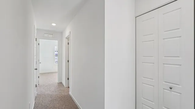 an empty room with a hallway