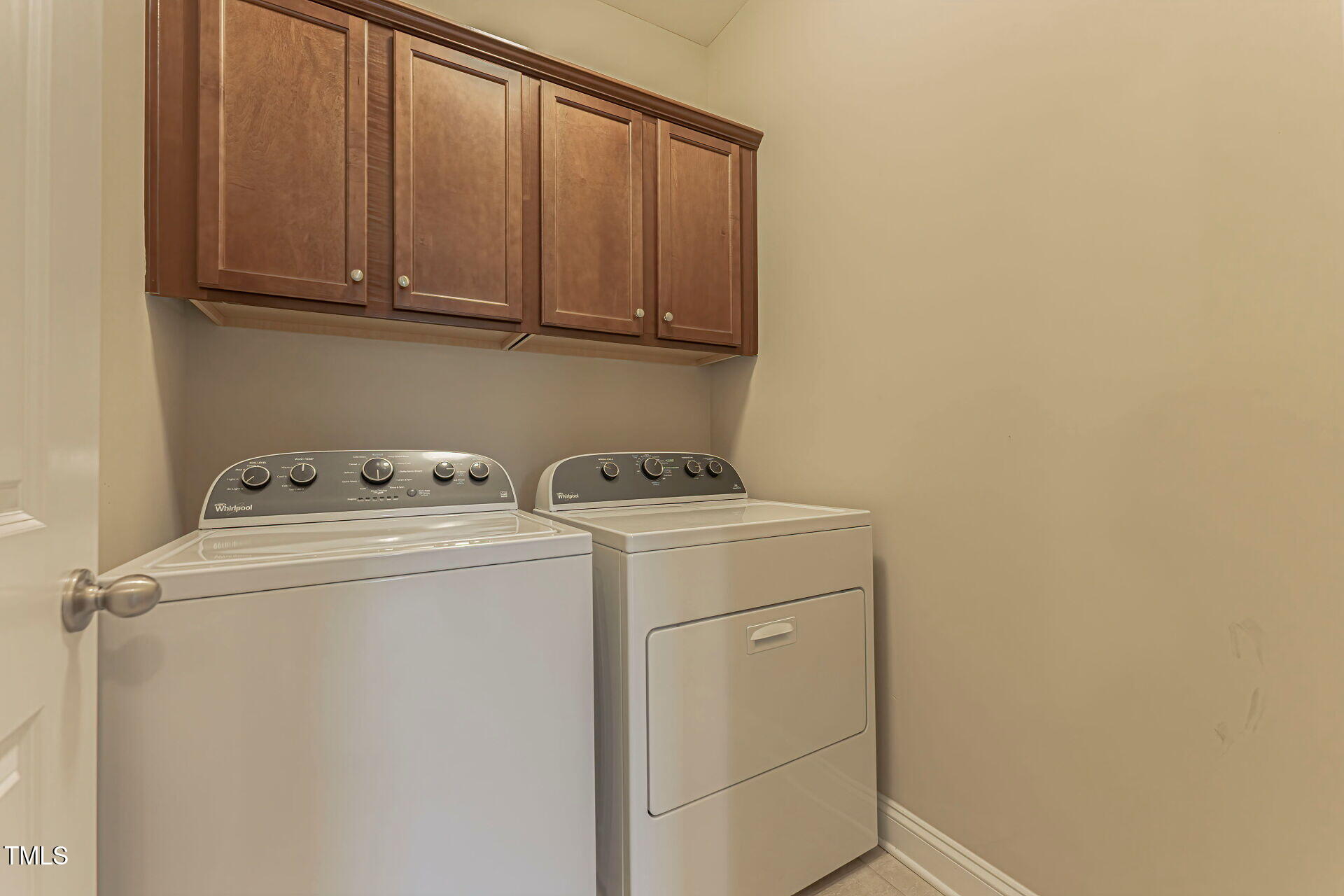 3606 Winifred Way Raleigh, NC 27609 - Photo 23 of 45 a utility room with dryer and washer