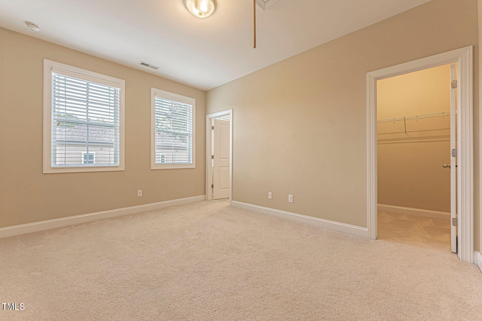 3606 Winifred Way Raleigh, NC 27609 - Photo 24 of 45 an empty room with windows