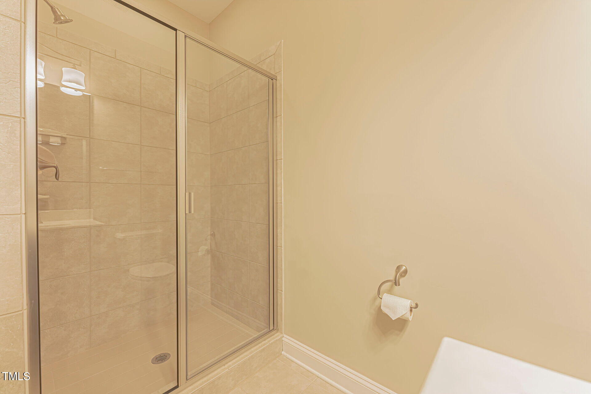 3606 Winifred Way Raleigh, NC 27609 - Photo 40 of 45 a bathroom with a shower and a sink