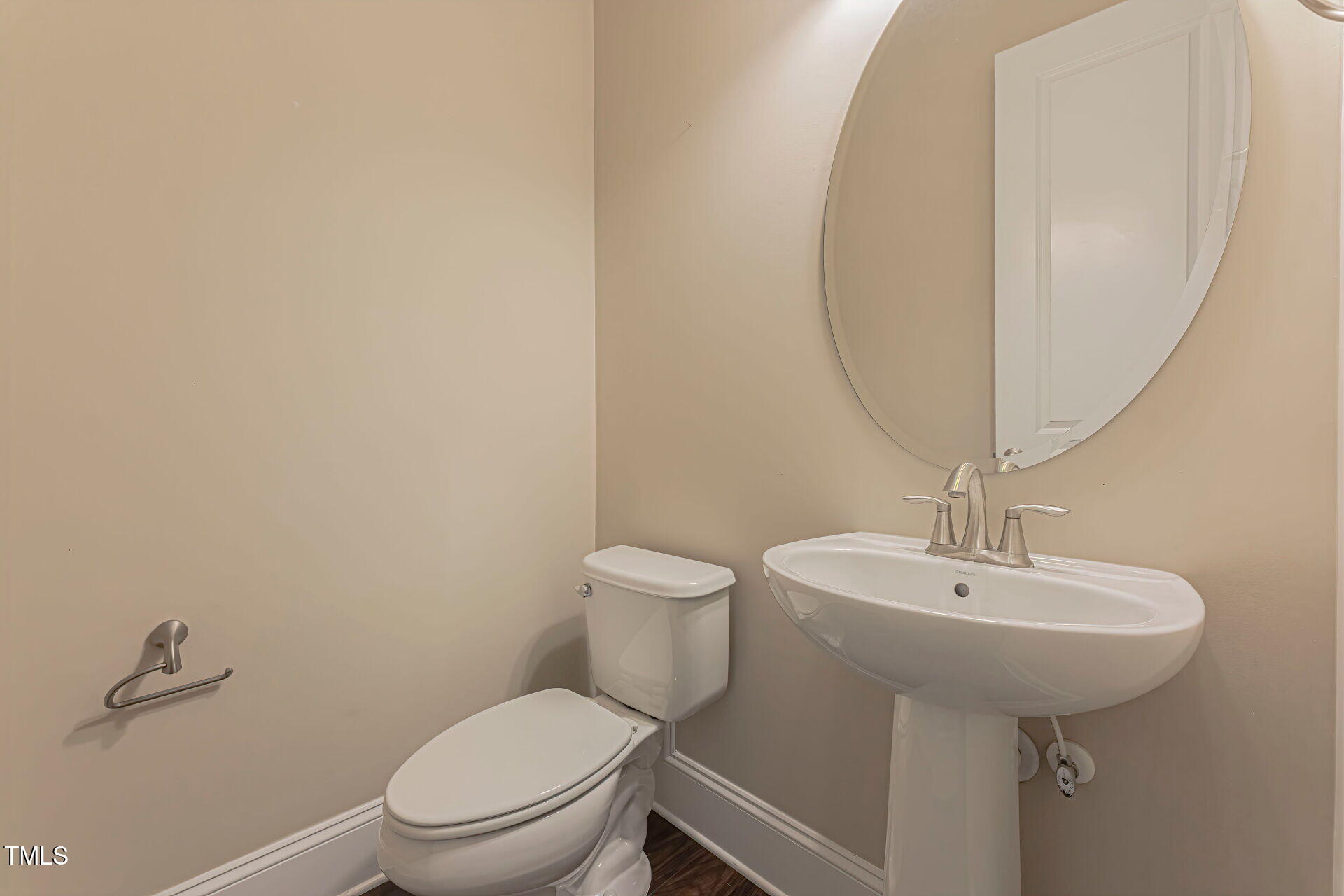 3606 Winifred Way Raleigh, NC 27609 - Photo 8 of 45 a bathroom with a sink a toilet and a mirror
