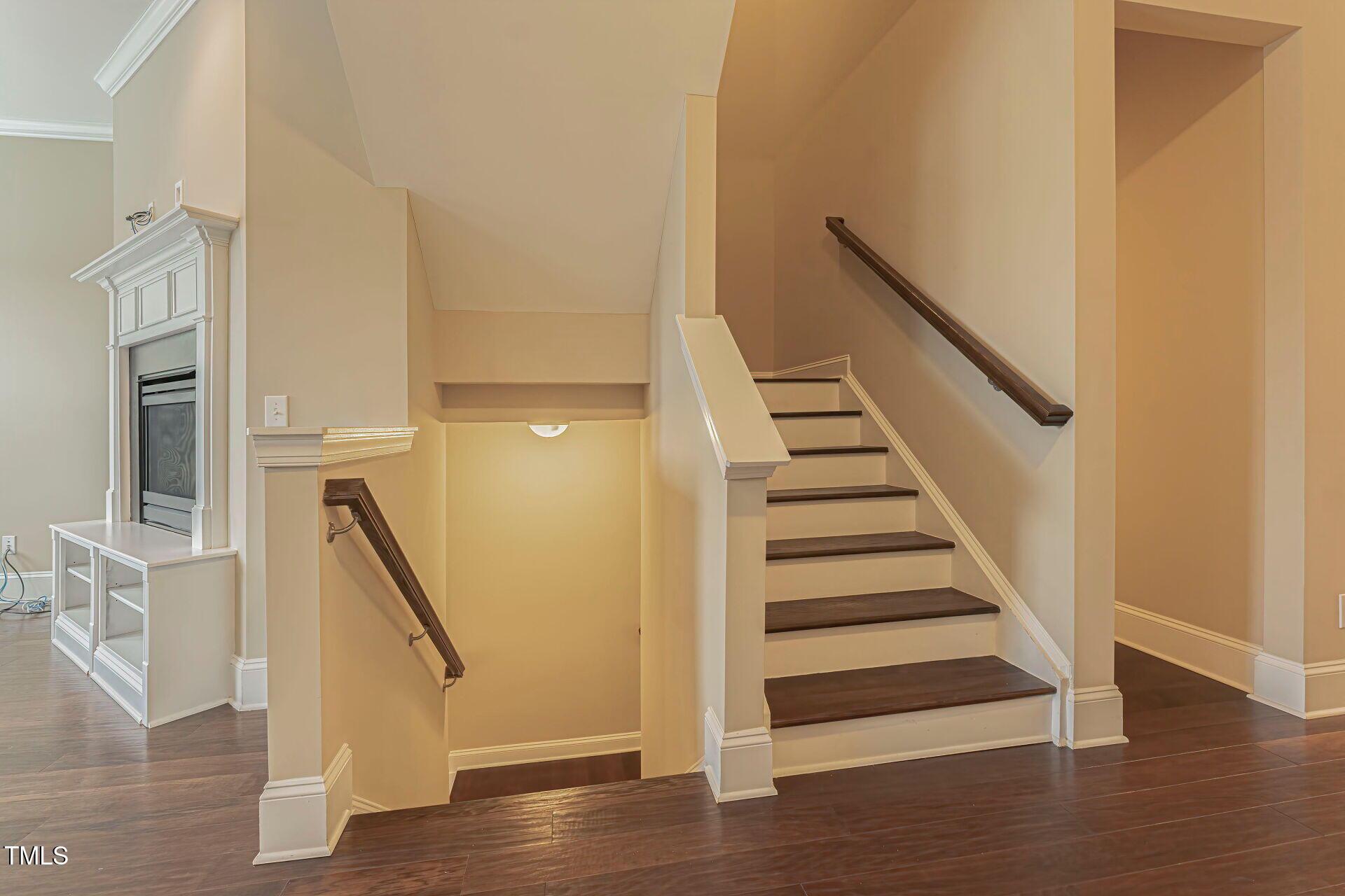 3606 Winifred Way Raleigh, NC 27609 - Photo 10 of 45 a view of entryway with wooden floor and stairs