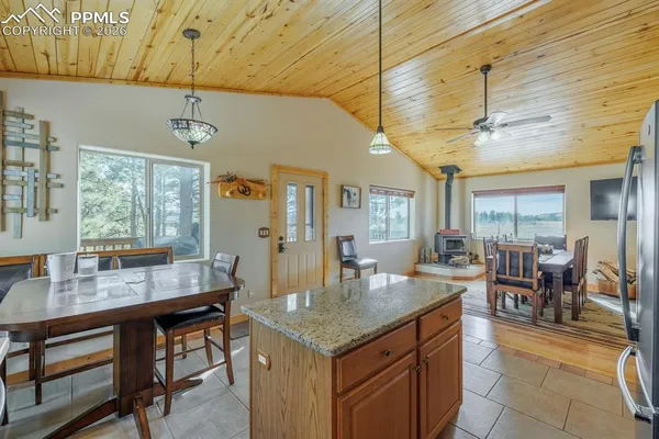 a room with granite countertop lots of counter top space
