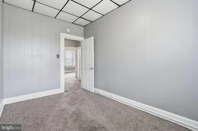 a bathroom with a tub and a shower