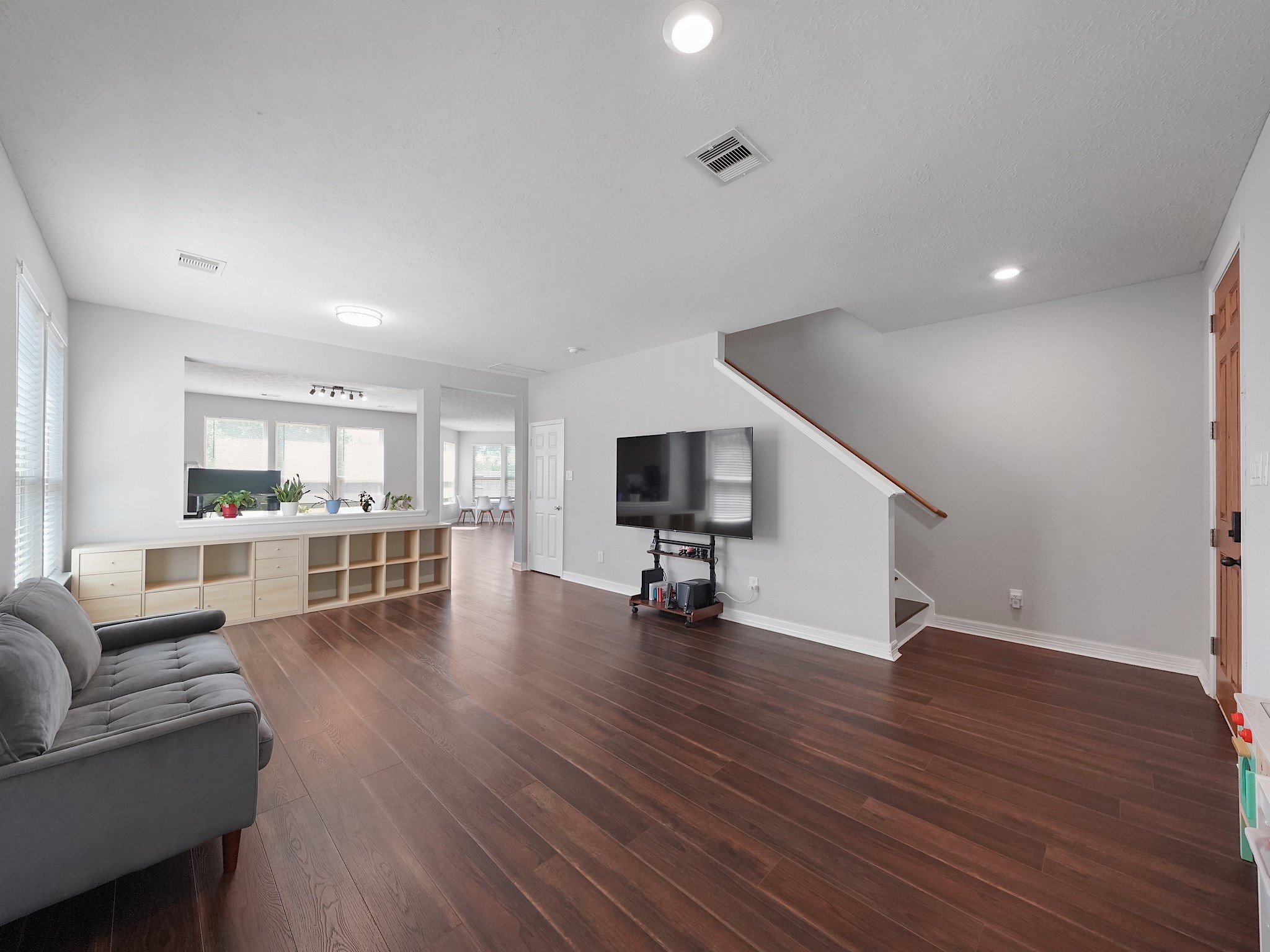 24131 Adobe Ridge Lane Katy, TX 77493 - Photo 5 of 37 a living room with furniture and a flat screen tv