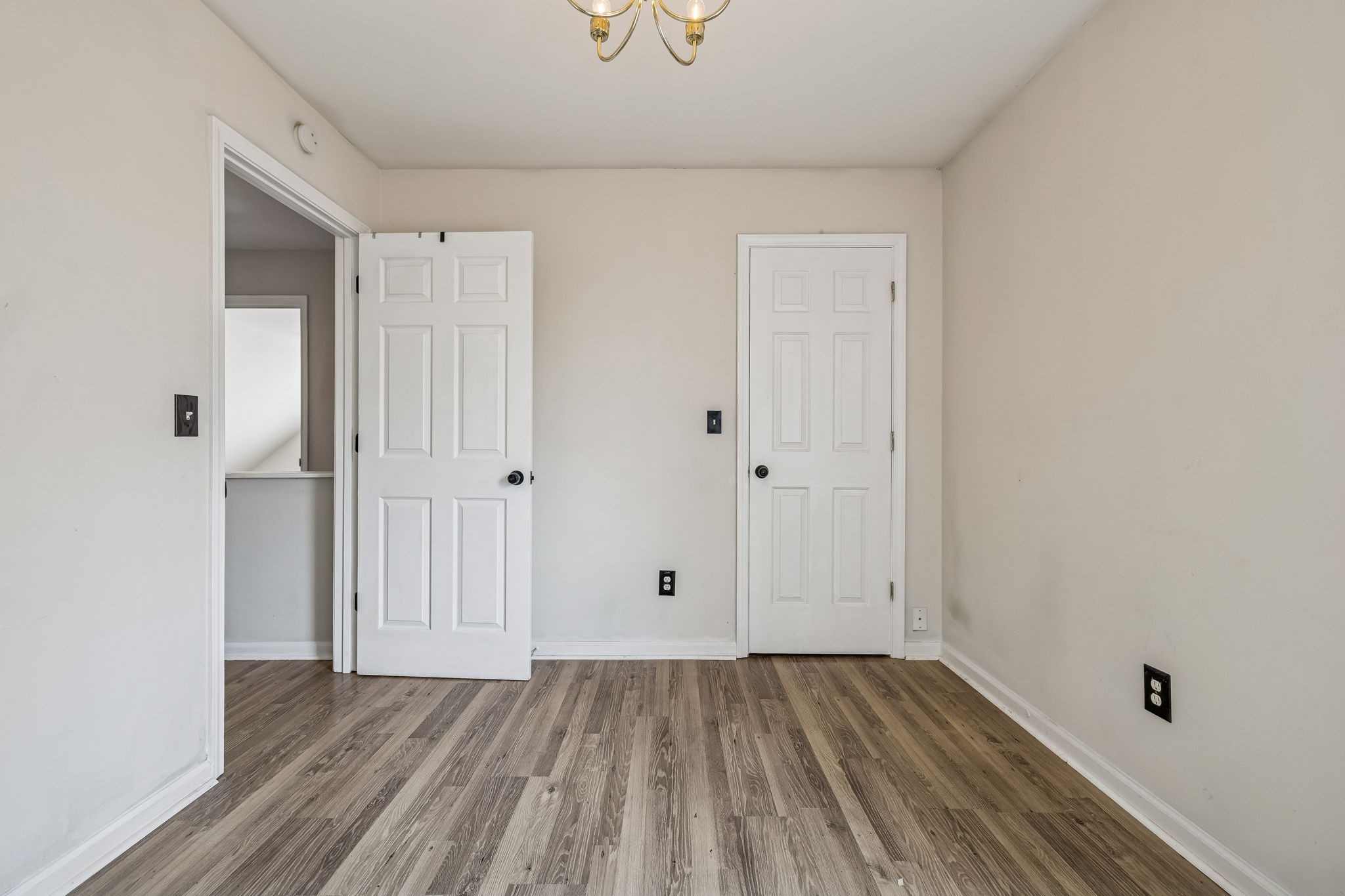 7701 Poplar Ridge Drive Nashville, TN 37221 - Photo 15 of 28 a view of an empty room with wooden floor