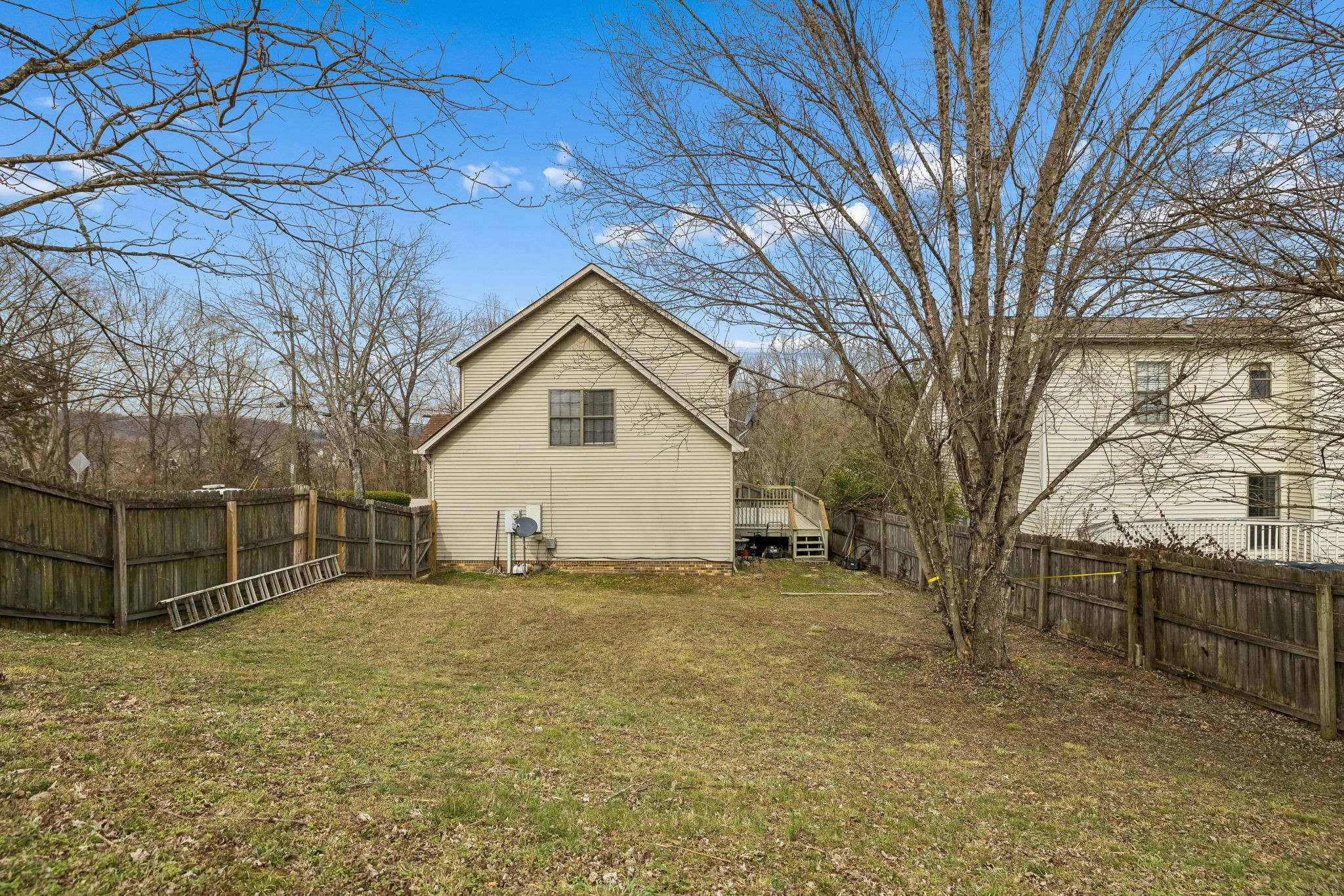 7701 Poplar Ridge Drive Nashville, TN 37221 - Photo 27 of 28 a view of a house with a yard