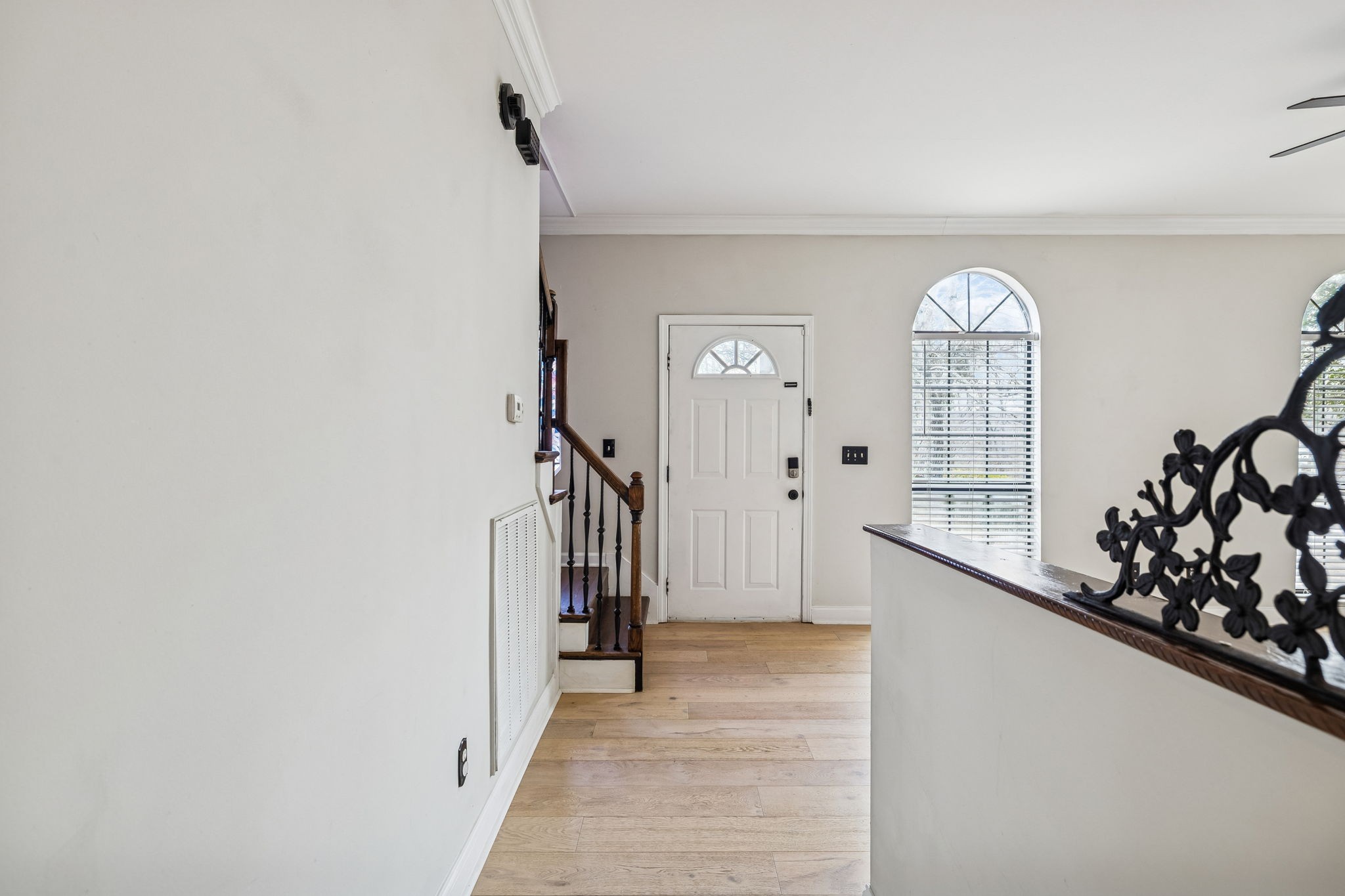 7701 Poplar Ridge Drive Nashville, TN 37221 - Photo 3 of 28 a view of a hallway with wooden floor and staircase
