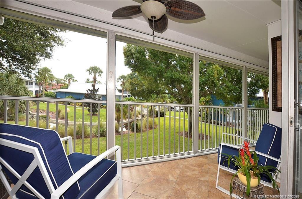 1854 Southwest Palm City Road, Unit 203 Stuart, FL 34994 - Photo 2 of 38 a view of a chairs in balcony