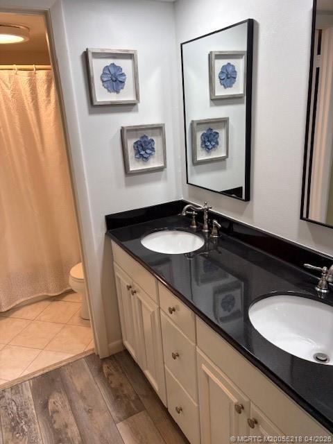 1854 Southwest Palm City Road, Unit 203 Stuart, FL 34994 - Photo 25 of 38 a bathroom with a sink and a mirror