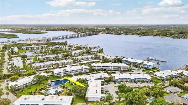 a kitchen with a sink stove and microwave