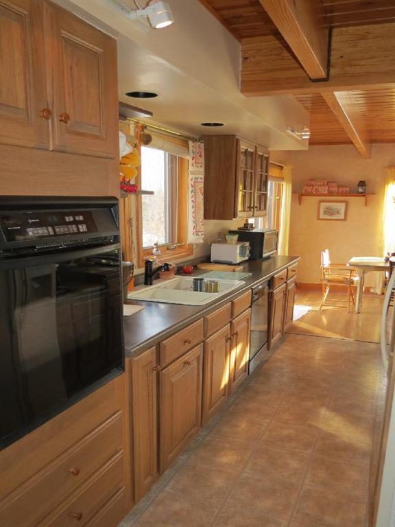 3328 Middle Road Sidney, ME 04330 - Photo 6 of 23 Enter the gallery style kitchen.