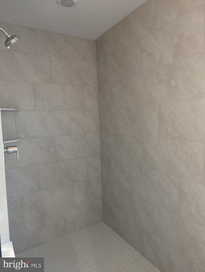 469 Hanson Street Frederick, MD 21701 - Photo 14 of 16 a bathroom with a shower