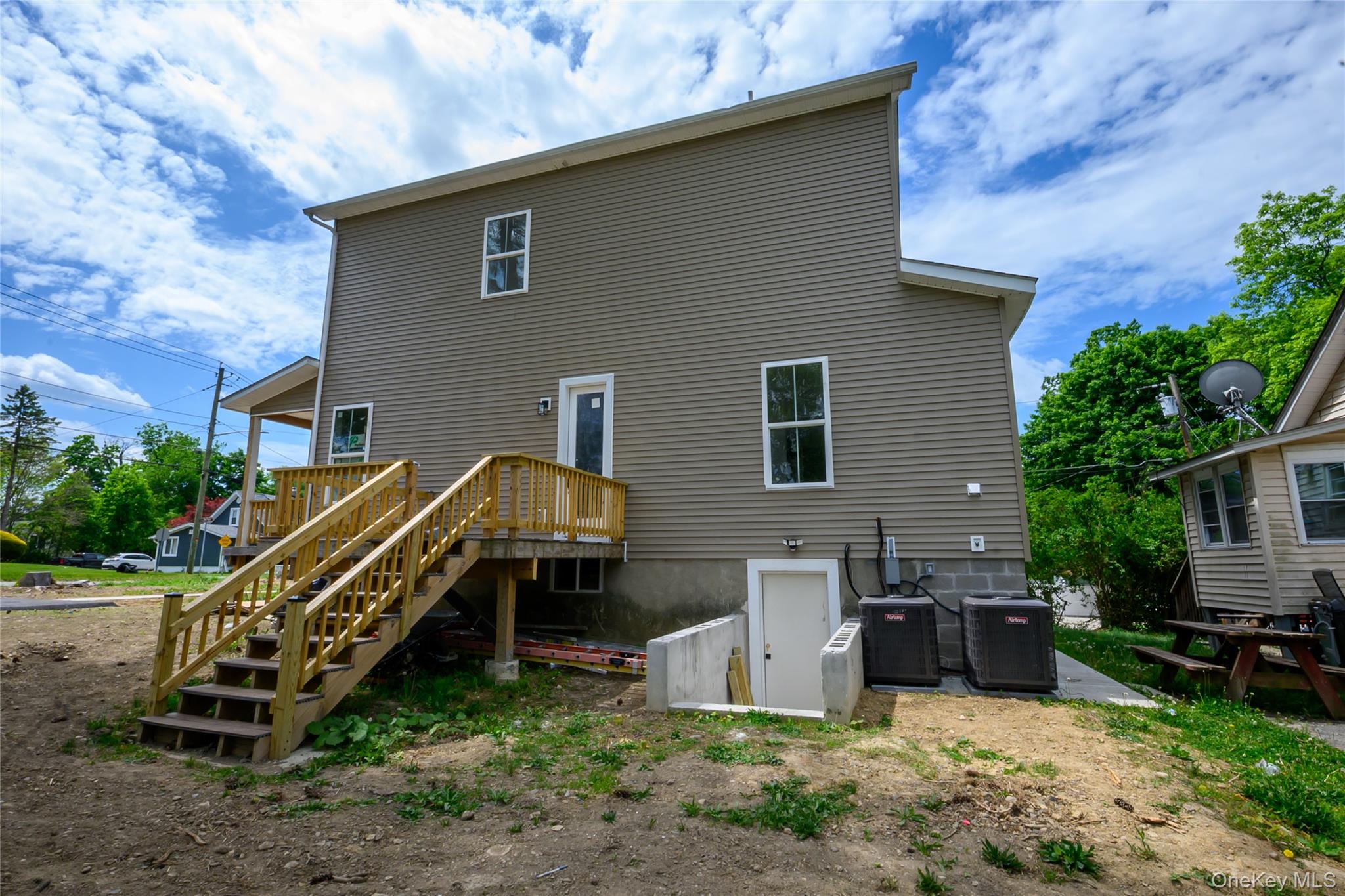 81 Silver Lake Sctn Road Middletown, NY 10940 - Photo 31 of 37 a view of a house with a yard and sitting area