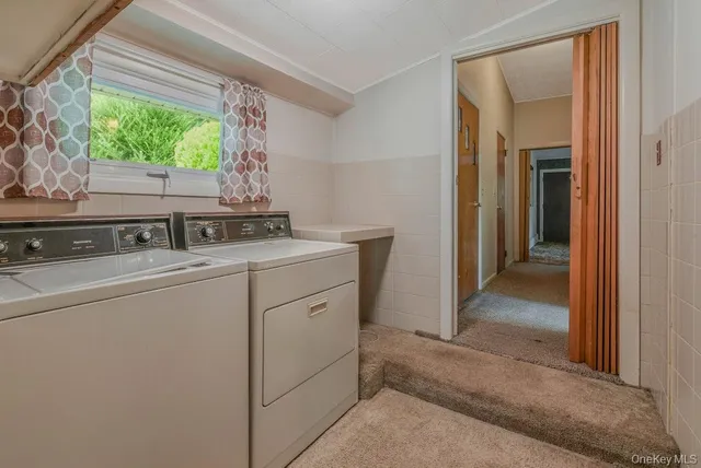 a view of a room with wooden walls