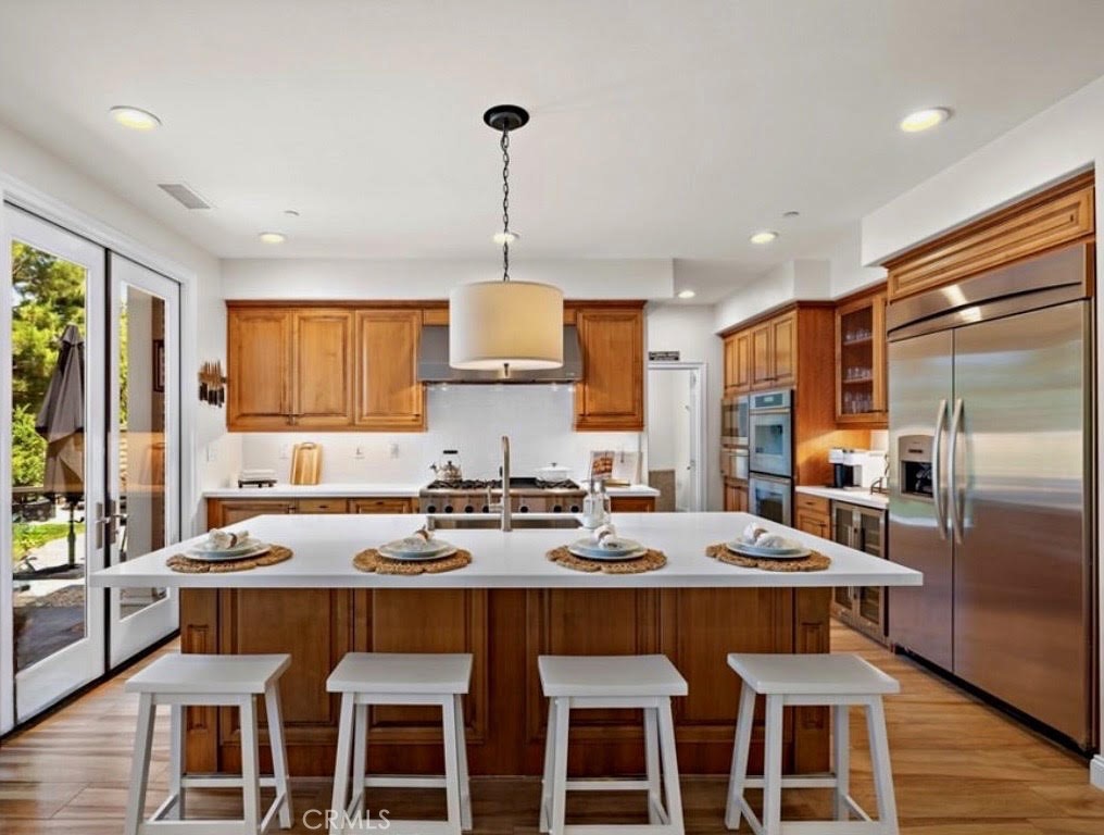 3 Tranquility Place Ladera Ranch, CA 92694 - Photo 18 of 64 a kitchen with a counter space a sink appliances and cabinets
