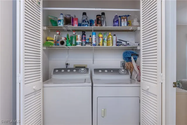 an aerial view of a house with a lake view