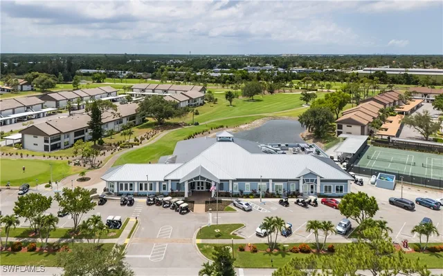 an aerial view of a city with lawn chairs