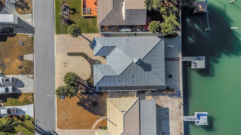 1445 Corey Way South South Pasadena, FL 33707 - Photo 56 of 61 an aerial view of a house with swimming pool and porch
