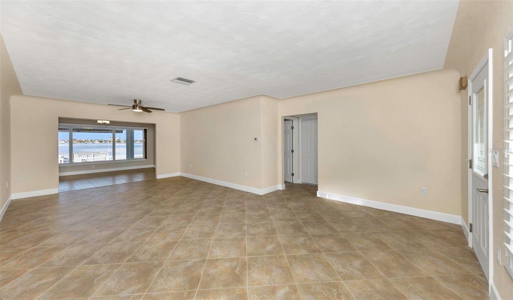 1445 Corey Way South South Pasadena, FL 33707 - Photo 6 of 61 a view of an empty room with a window