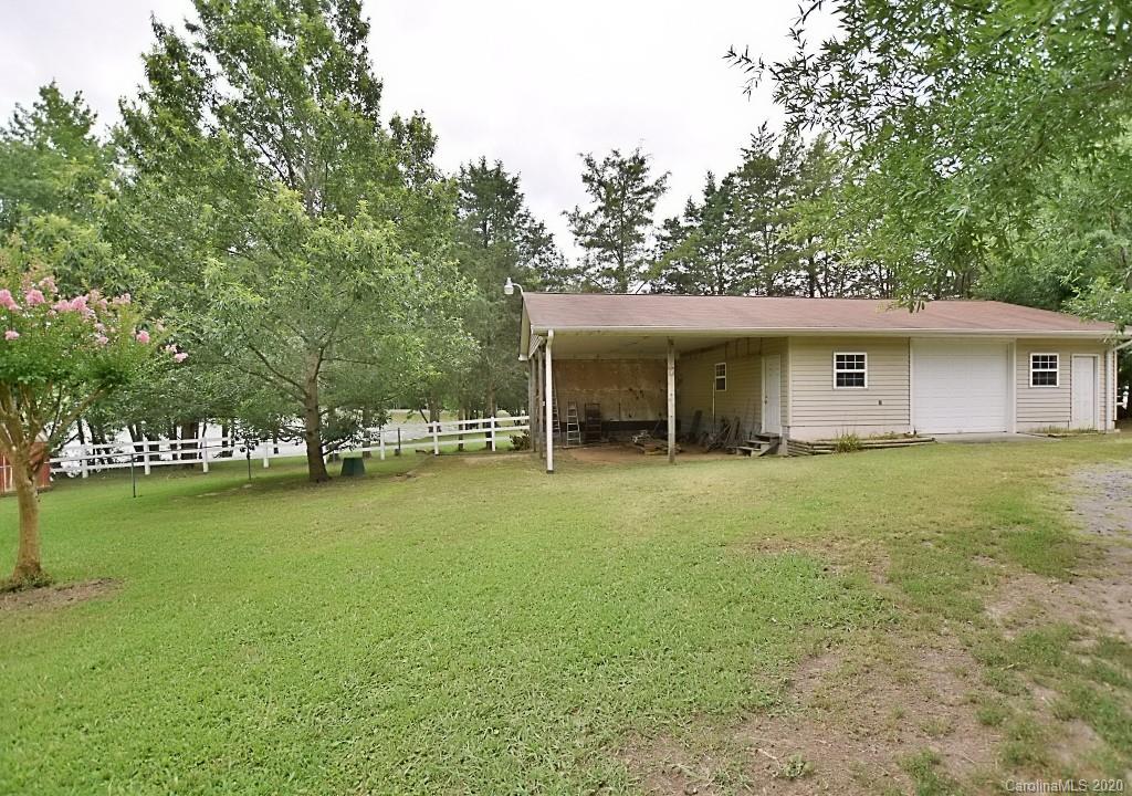 8940 Collins Road Indian Land, SC 29707 - Photo 3 of 28 a view of a house with a garden