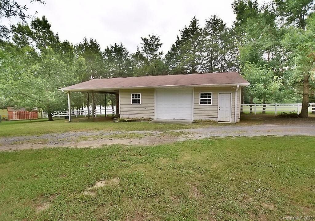 8940 Collins Road Indian Land, SC 29707 - Photo 22 of 28 a front view of house with yard and green space