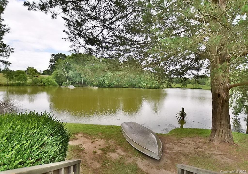 8940 Collins Road Indian Land, SC 29707 - Photo 4 of 28 a view of a lake from a yard