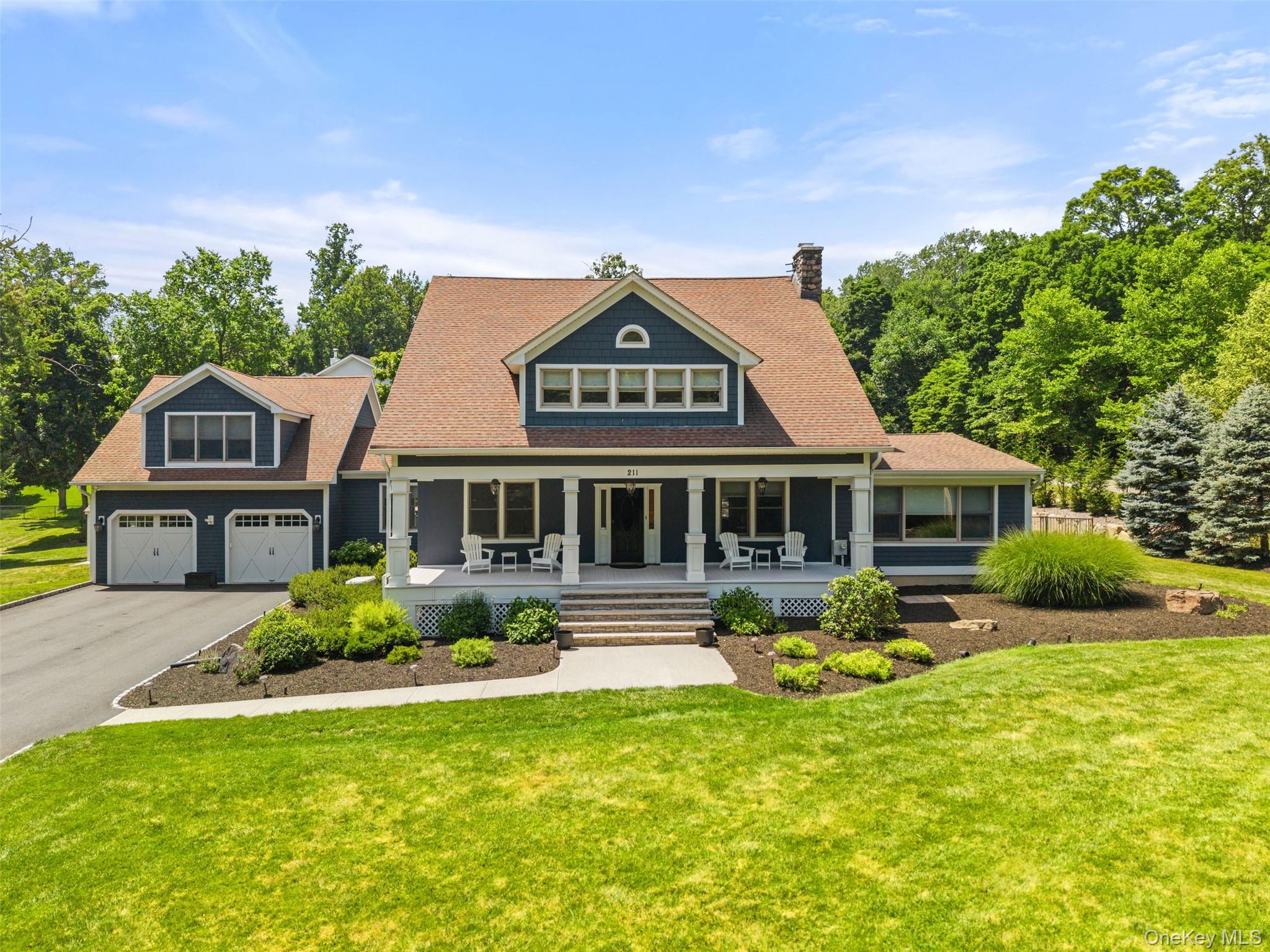 211 Strawtown Road West Nyack, NY 10994 - Photo 2 of 47 Where timeless architecture meets modern luxury.