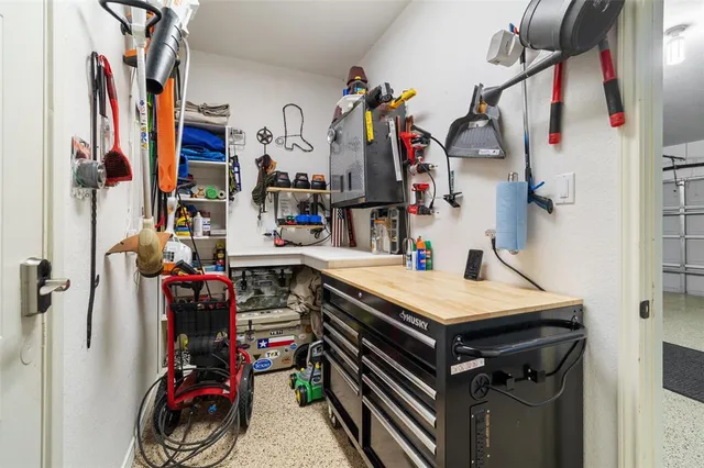 a view of a house with a flower garden