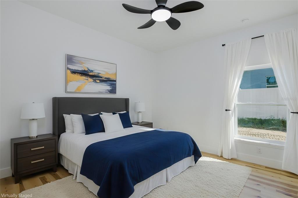 11277 Fool Duck Avenue Weeki Wachee, FL 34613 - Photo 19 of 75 a bedroom with a bed and a window