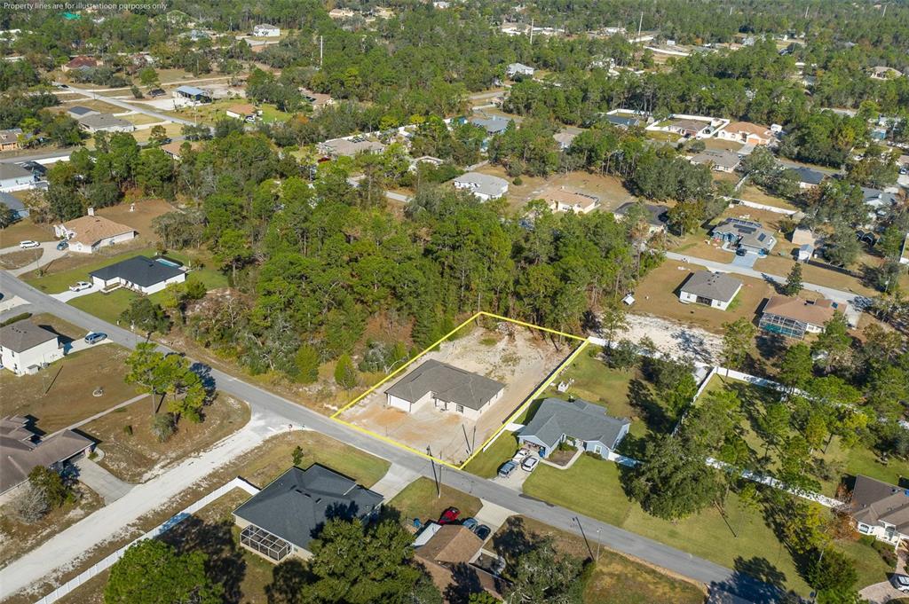 11277 Fool Duck Avenue Weeki Wachee, FL 34613 - Photo 29 of 75 an aerial view of a residential houses with outdoor space