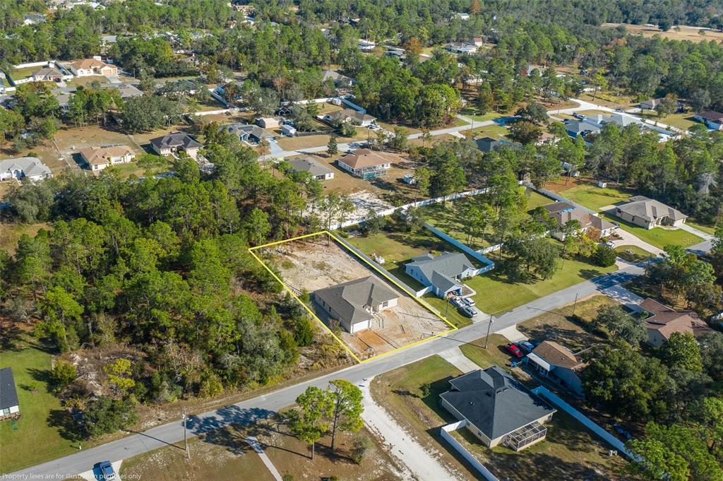 11277 Fool Duck Avenue Weeki Wachee, FL 34613 - Photo 31 of 75 an aerial view of residential houses with outdoor space